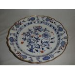 A 19th Century German china circular charger with floral decoration 17" diameter (af)