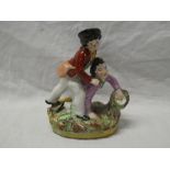 A Victorian Staffordshire pottery figure of two drunken figures,