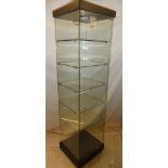 A good quality glass freestanding mobile square section display cabinet with shelves, LED lighting,