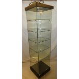 A good quality glass freestanding mobile square section display cabinet with shelves, LED lighting,