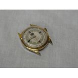 A gentleman's gilt wristwatch by Crown with decorated dial "Unbreakable Spring, Super Shockproof,