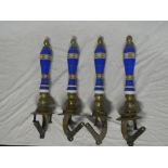 Four old brass and ceramic beer pump handles with floral decoration (one af)