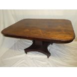 An early to mid 19th Century rosewood tilt top centre table/breakfast table on square tapered