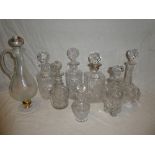 Six various cut glass decanters,