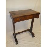 A 19th Century rosewood rectangular centre table with a single drawer in the frieze on rectangular