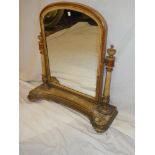 A 19th Century arched toilet mirror with original stained and painted decoration on turned supports