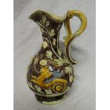 A 19th Century majolica pottery baluster-shaped jug decorated in relief with mythical figures and