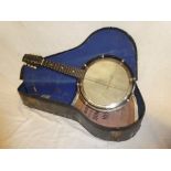A small 8-string banjo 22" long in fitted case