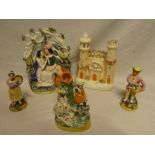 Five various 19th Century and later Staffordshire pottery figures including male and female in a