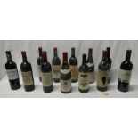 Twelve bottles of red wine including 1990 Chassagne-Montrachet, 1990 Aloxe Corton,