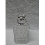 A good quality cut glass square-shaped decanter with silver mounted neck by Asprey & Co,