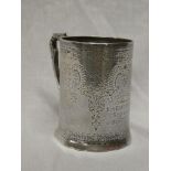 An Edward VII silver christening-style tankard with engraved decoration and angular handle,