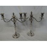 A pair of silver plated three branch candelabra with adjustable stems, the base engraved "Lt. Cl. G.