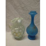 An opaline tinted glass tapered jug with roundel decoration,