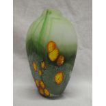 A Cornish art glass tapered vase by Norman Stuart Clarke with floral decoration on green ground,