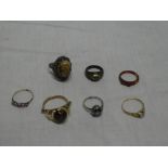 An 18ct gold dress ring set single diamond,