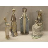 A large Lladro china figure of a seated female with puppy and three other Lladro china female