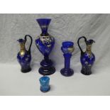 A Victorian blue tinted glass baluster-shaped vase with painted decoration,