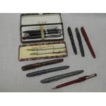 A small selection of various collector's pens and pencils,