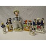 Six various 19th Century Staffordshire pottery figures of sailors including a standing sailor