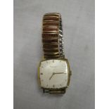 A gentleman's gold plated wristwatch by Bucherer "Intra-Matic" with silvered square dial and