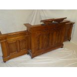 A good quality figured pitch pine lectern/rostrum with panelled front,