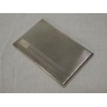 A George VI silver rectangular cigarette case with engine turned decoration,