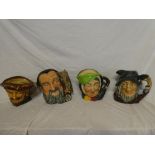 Four Royal Doulton large size character jugs including Drake, Merlin,