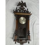 A good quality wall clock with silvered dial by W B Michell & Sons Penzance in polished mahogany