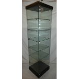 A good quality glass freestanding mobile square section display cabinet with shelves, LED lighting,