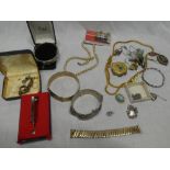 A selection of various costume jewellery including rope twist necklace, silver bangle,