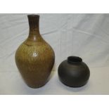 A Studio pottery brown glazed tapered vase, signed "MW",