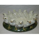A modern glazed Studio pottery bowl, the rim decorated with twelve birds,