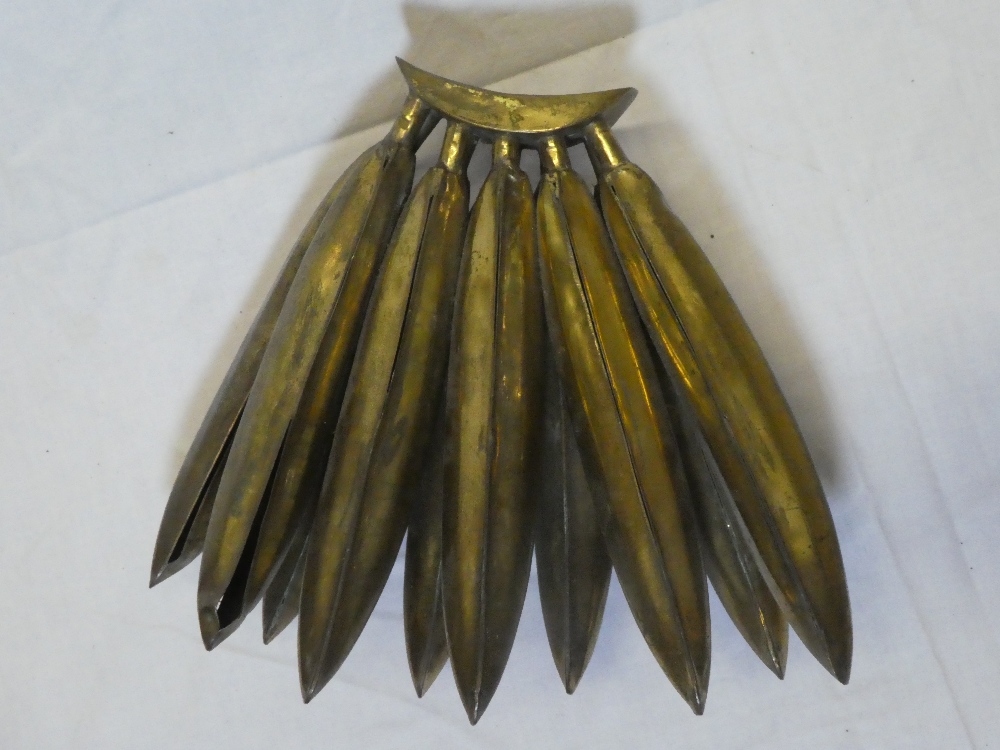 An unusual brass hanging figure of a bunch of ten bananas,