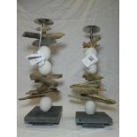 A pair of Cornish natural stone and driftwood candleholders by David Raine of St Ives,