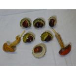 A selection of six painted acrylic figures of horse-chestnuts and two similar toadstools