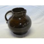 A Lakes Cornish Truro Pottery brown glazed terracotta jug,