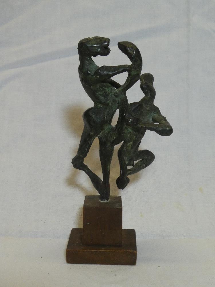 A modern bronze group of two males in the style of Michael Ayrton,