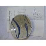 A Studio porcelain circular dish by Nic Harrison with original Newlyn Orion Galleries receipt dated