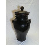 A large Studio pottery two-handled vase and cover in black and brown glazes, 21" high,