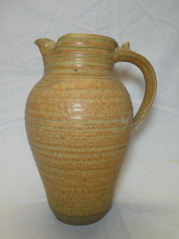 A Barry Huggett Truro Pottery tapered jug with loop handle, signed,