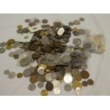 A large selection of mixed foreign coins including some silver examples