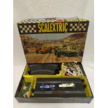 A Scalextric No 50 set in original box with track including two cars and accessories