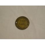 A 19th Century brass Cornish one sack token for S T Tregaskis St Issey