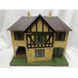 A 1960's Triang doll's house with opening front