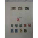 A selection of album leaves containing a collection of Canada stamps,