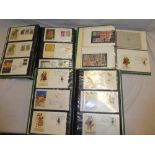 Three albums containing a collection of over 230 Spanish first day covers 1967-1973 and a small