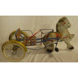 A 1950s Triang three wheel pedal ride-on horse and trap,