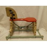 An old Triang painted wooden rubber sprung rocking horse,