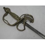 An old dress sword with etched steel blade by E Woods & Son London with brass ornamental hilt